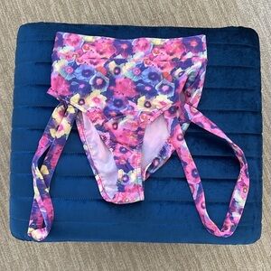 NWOT flower colorful rave bottoms with leg straps (size S/M)